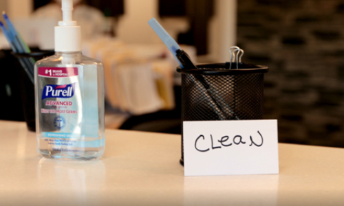 Hand Sanitizer and Pen Holder at dentistry